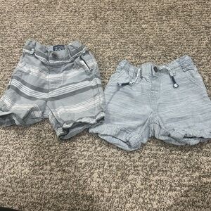 2 pairs of boys shorts size 2t.
